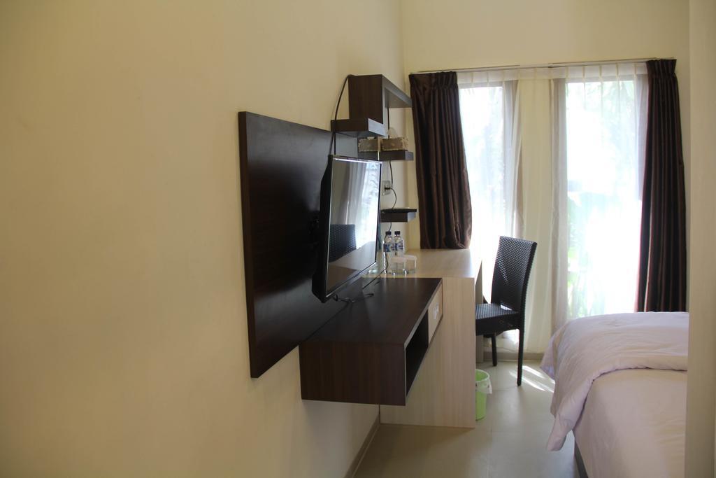פאלו Kampoeng Nelayan Hotel מראה חיצוני תמונה